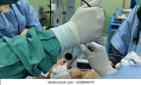 Anaesthetist perfotming Bronchoscopy through double lumen tube.