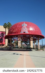 ANAHEIM, CALIFORNIA - 1 MAR 2021: Giant Baseball Cap At The Main Entrance To Angel Stadium Of Anaheim, Home Of The Los Angeles Angels Of Major League Baseball.