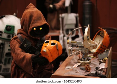 Anaheim, California - April 16 2015: A Jawa Building A Droid At Star Wars Celebration 2015.