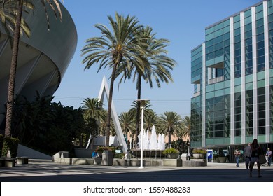 Anaheim, California / USA - October 15, 2019: People interface with the Anaheim Convention center.