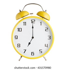 Analog alarm clock showing seven o'clock isolated on white background