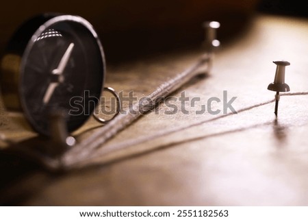 Analog Clock with Push Pins, Creative Time Management Concept in Warm Light