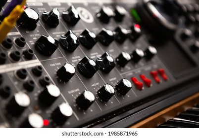 Analog Synthesizer For Electronic Musical Production. Professional Audio Equipment In Sound Recording Studio. Music Composer Hardware In Close Up