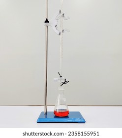 analysis by titration using a burette and erlenmeyer