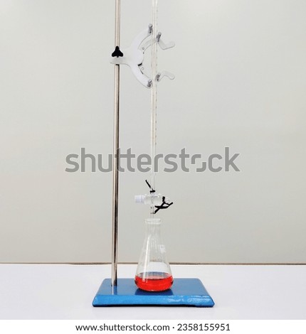 analysis by titration using a burette and erlenmeyer