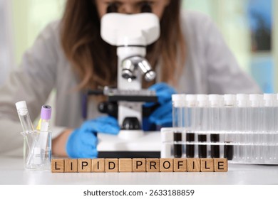 An analysis of lipid profiles using advanced microscopes, highlighting lab equipment and blood sample analysis