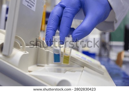 Analysis of liquid color samples in quartz cuvettes using a laboratory spectrophotometer.