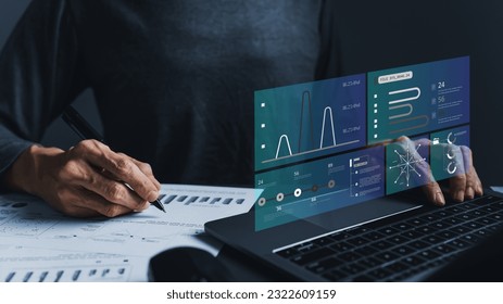 Analyst computer working with information database to analysis marketing sale data. Business project or program strategy planning and development for corporate operating finance and investment concept