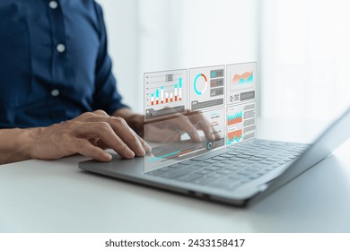Analyst computer working with information database to analysis marketing sale data 
Business project or program strategy planning and development for corporate operating finance and investment concept