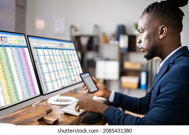 Analyst Employee Using Spreadsheet On Computer Screen