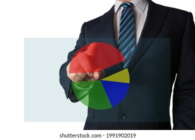 Analyst Pointing At A Pie Chart Illustrating Market Share, Sales Volume By Category, Or Showing Contributing Factors Or Composition Of A Certain Business Phenomenon.