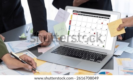 Analyst team use sticky note for creative and analytic brainstorm for business idea with BI data dashboard on laptop screen. Analysis financial data visualization tech for marketing strategy. Prodigy