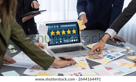 Analyst team use sticky note for creative and analytic brainstorm for business idea with BI data dashboard on laptop screen. Analysis financial data visualization tech for marketing strategy. Prodigy