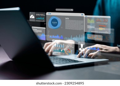 An analyst uses a computer and dashboard for data business analysis and Data Management System with KPI and metrics connected to the database for technology finance; operations; sales; marketing