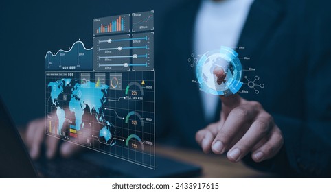 An analyst uses a computer and dashboard for data business analysis and Data Management System with KPI and metrics connected to the database for technology finance, operations, sales, marketing