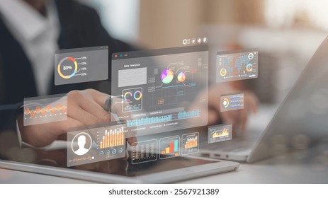 An analyst uses a computer and dashboard for data business analysis and a Data Management System with KPI and metrics connected to the database for technology finance, operations, sales, marketing