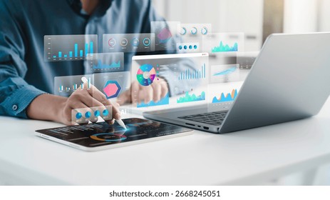 An analyst uses a computer and dashboard for data business analysis and Data Management System with KPI and metrics connected to the database for technology finance, operations, sales, marketing