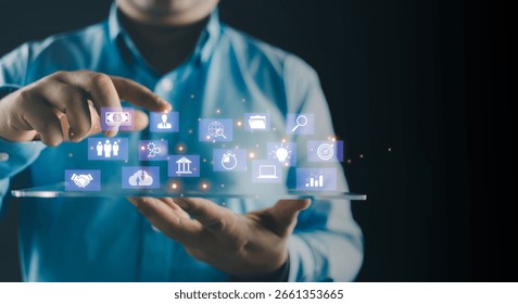 An analyst uses a virtual screen for data business analysis and Data management system. Customer database, gather information to report. Data science and digital marketing