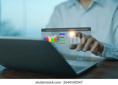 Analyst using laptop to analyze data. shows a dashboard chart for business data analysis and metrics connected to the database for digital technology finance, Analytics concept, Social network, operat