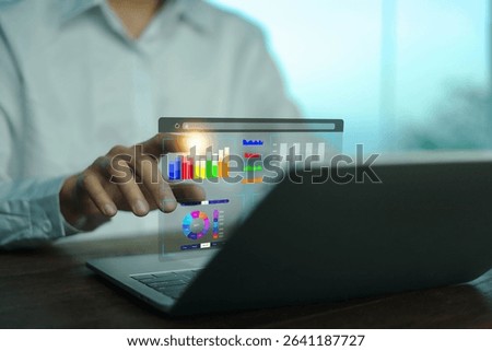 Analyst using laptop to analyze data. shows a dashboard chart for business data analysis and metrics connected to the database for digital technology finance, Analytics concept, Social network, operat