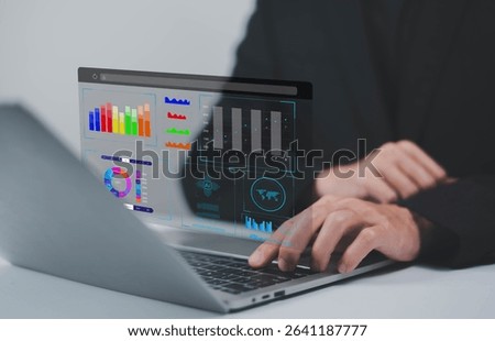 Analyst using laptop to analyze data. shows a dashboard chart for business data analysis and metrics connected to the database for digital technology finance, Analytics concept, Social network, operat