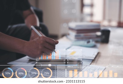 Analyst working with Business Analytics and Data Management System on computer, make a report with KPI and metrics connected to database. Corporate strategy for finance, operations, sales, marketing.