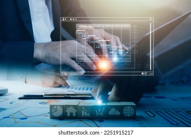 Analyst working with computer in Business Analytics and Data Management System to make report with KPI and metrics connected to database. Corporate strategy for finance, operations, sales, marketing.