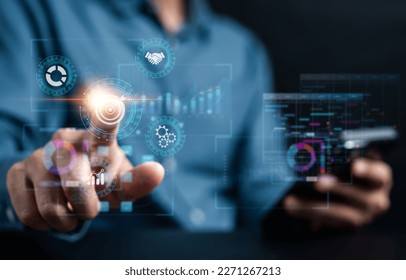 Analyst working with computer in Business Analytics and Data Management System to make report with KPI and metrics connected to database. Corporate strategy for finance, operations, sales, marketing.