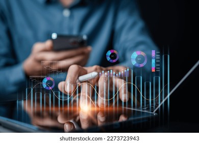 Analyst working with computer in Business Analytics and Data Management System to make report with KPI and metrics connected to database. Corporate strategy for finance, operations, sales, marketing.