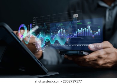 Analyst working with computer in Business Analytics and Data Management System to make report with KPI and metrics connected to database. Corporate strategy for finance, operations, sales, marketing.