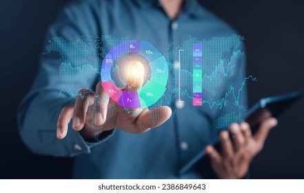 Analyst working with computer in Business Analytics and Data Management System to make report with KPI and metrics connected to database. Corporate strategy for finance, operations, sales, marketing.