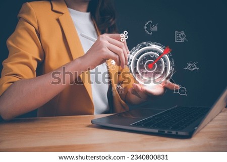 Analyst working with computer in business analytics and data management system. Concept of achieving business goal, keys to success, strategic, planning, work performance is influenced by skills.