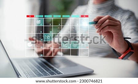 Analyst working with computer in management system to make report with KPI and metrics connected to database. corporate strategy for finance, operations, sales, marketing.Project management concept.