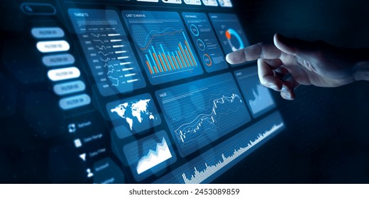 Analyst working with Financial Data and Business Analytics Dashboard on computer to make Financial Report with KPI and Metrics. Investment, Corporate Finance, Strategy, Operations, Sales. - Powered by Shutterstock