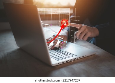 Analyst Working With Laptop (notebook) In Success Startup Business Concept. Businessman With Hologram Of Data Management System Statistics And Analytics. KPI Report And Planning Strategy.