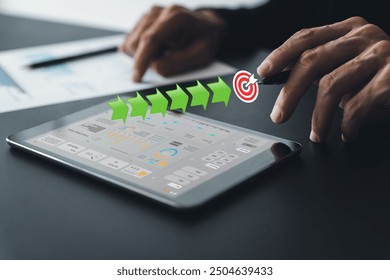 Analyst working on information database to analysis marketing sale data. Success business project or program strategy planning and development for corporate achievement operating finance investment