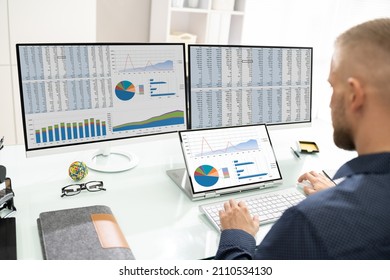 Analyst Working With Spreadsheet Business Data On Computer - Powered by Shutterstock