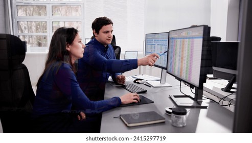 Analyst Working With Spreadsheet Business Data On Computer