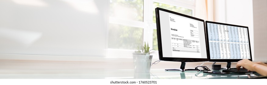 Analyst Working With Spreadsheet On Computer Screen