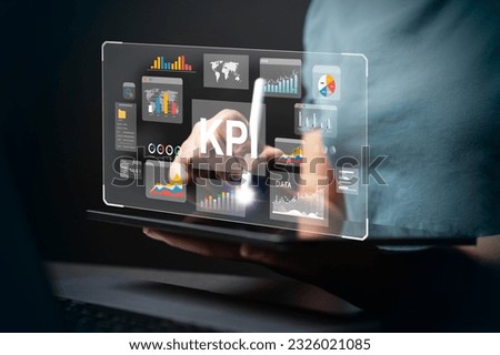 Analysts use ipad for business analytics and data management systems with KPIs and metrics dashboards connected to databases for finance, technology, operations, sales, marketing.