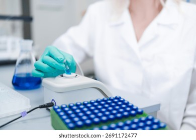 Analytical chemist preparing samples for HPLC analysis to identify and quantify compounds