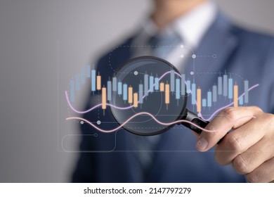 Analytical data and development statistics. Web analytics and product testing techniques are being measured. A guy studies an SEO dashboard and a digital report. - Shutterstock ID 2147797279