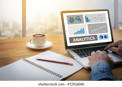 ANALYTICS (Analysis Analytic Marketing  Graph Diagram) Computing Computer  flare sun, Cropped image male freelancer sitting at the table