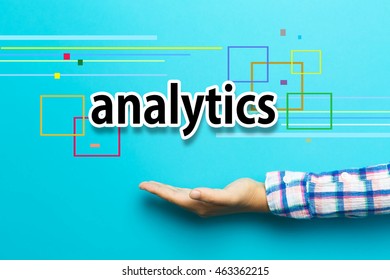Analytics concept with hand on blue background