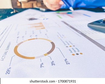 analytics graph and pie chart on many paperwork and statistical. business workplace and finance concept.