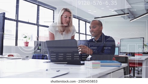 Analyzing data and collaborating over digital interface in modern office image. technology, business, teamwork, innovation, communication, collaboration