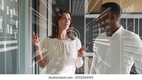 Analyzing data on screen, business professionals with futuristic interface image. Technology, innovation, data analysis, digital, team, collaboration - Powered by Shutterstock