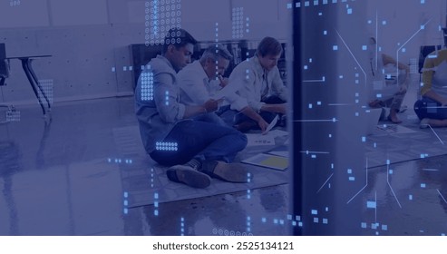 Analyzing documents, group of people sitting on floor with data processing image. Teamwork, collaboration, data analysis, brainstorming, meeting, technology - Powered by Shutterstock