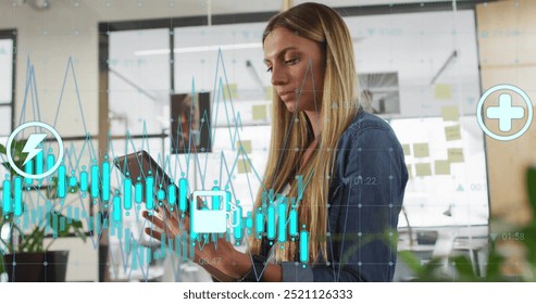 Analyzing financial data image over woman using smartphone in office. Business, finance, technology, innovation, data analysis, mobile - Powered by Shutterstock