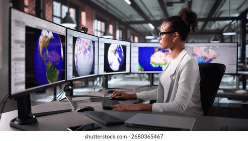 Analyzing Weather Data To Predict Climate Change Disasters In Office. Woman Using Computer To Track Hurricane